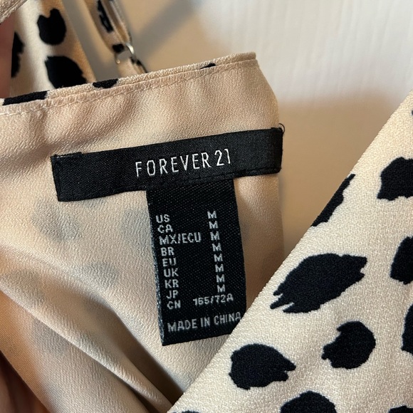 Forever 21 romper. Criss cross back, tie around waist, and side zipper. - Picture 5 of 5